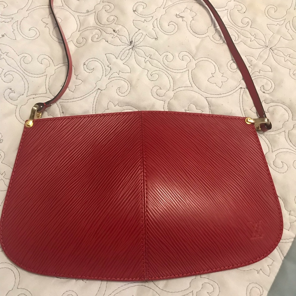 Louis Vuitton red clutch purse/not authentic